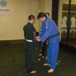 James receiving his blue belt.