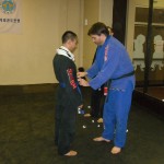 James receiving his blue belt.